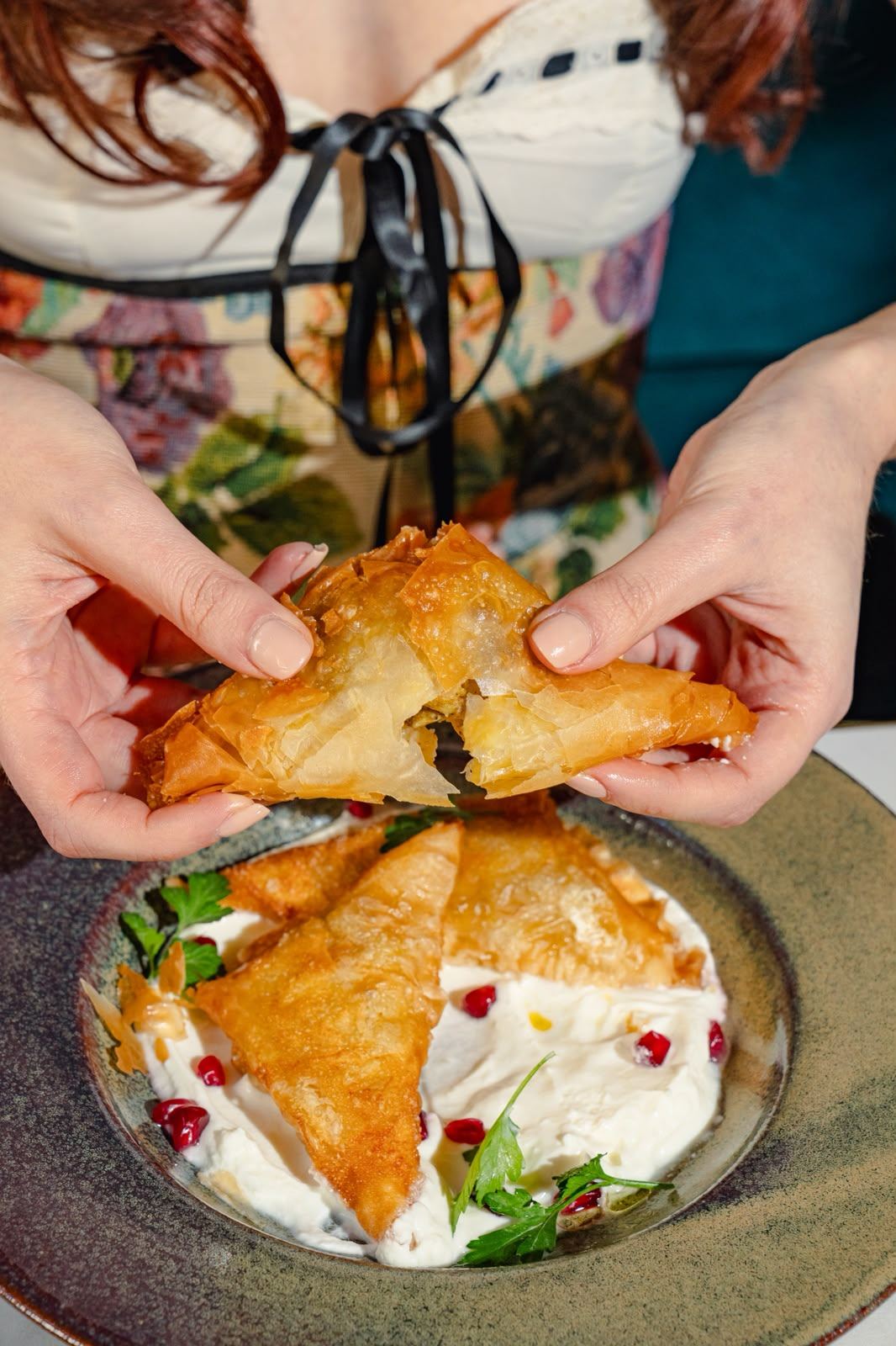 Maïra Ignazzi — hands holding a filo pastry